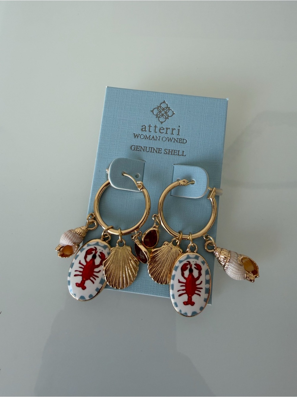 Atterri Gold Hoop Earrings with Red Lobster Shell Charms